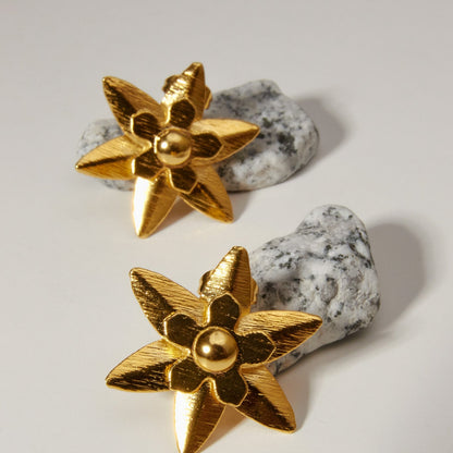 Tachuelas con forma de espiga de flores